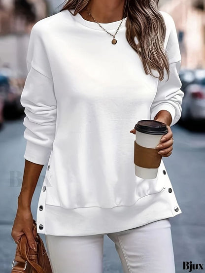 BLUSA CON ABERTURAS LATERALES