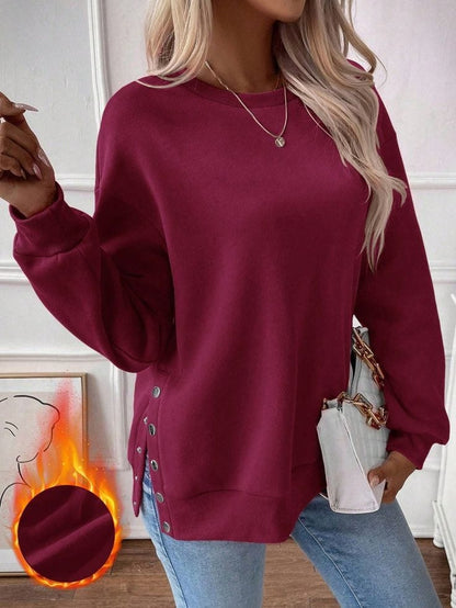 BLUSA CON ABERTURAS LATERALES