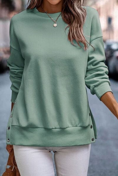 BLUSA CON ABERTURAS LATERALES